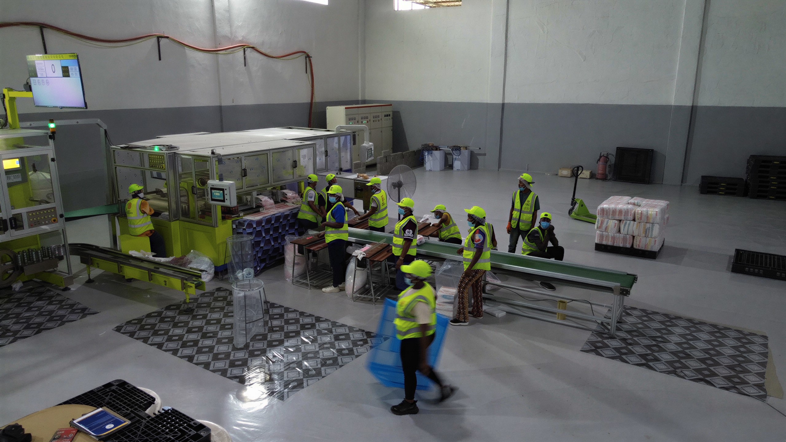 Baby diaper production line at Soft Snuggles factory in Sierra Leone